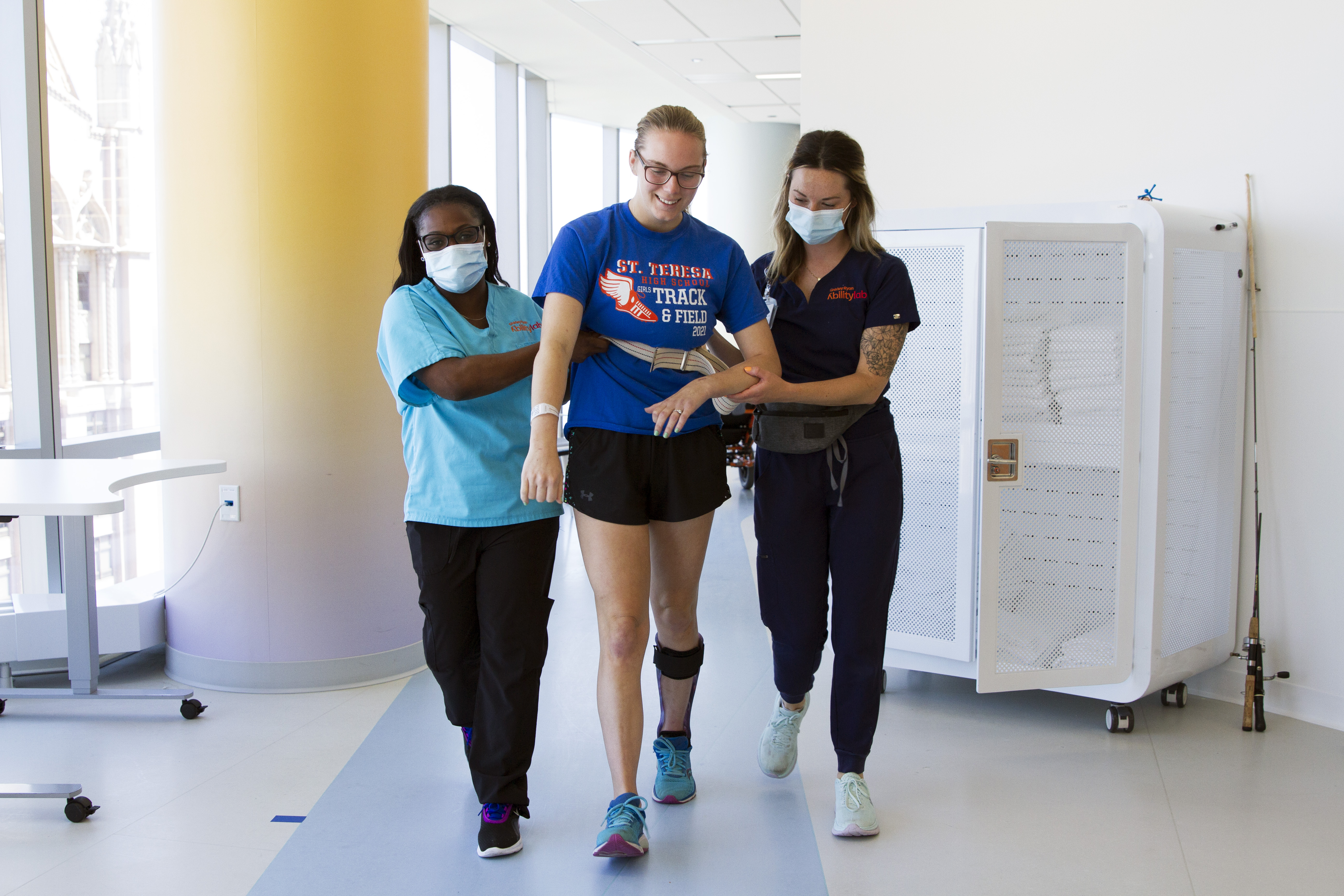 Therapist Helping Patient Walk